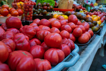 Various fresh tomatoes on the street market