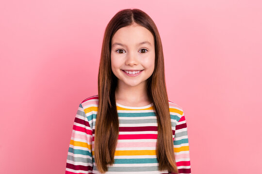 Photo portrait closeup image of cheerful big smile toothy girl brown hair overjoyed look camera excited isolated on pink color background