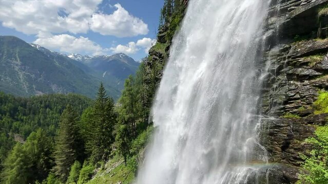 Stuibenfall waterfall bigest waterfall in Tirol in the &Ouml;tztal valley in Tyrol Austria during a beautiful springtime day in the Alps. Slow motion clip.