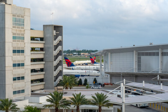 Delta Passenger Airplanes at the Louis Armstrong International Airport Terminal on March 31, 2023 in New Orleans, LA, USA