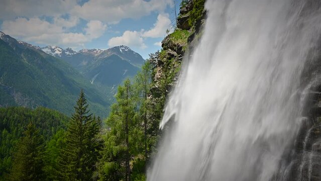 Stuibenfall waterfall bigest waterfall in Tirol in the &Ouml;tztal valley in Tyrol Austria during a beautiful springtime day in the Alps. Slow motion clip.