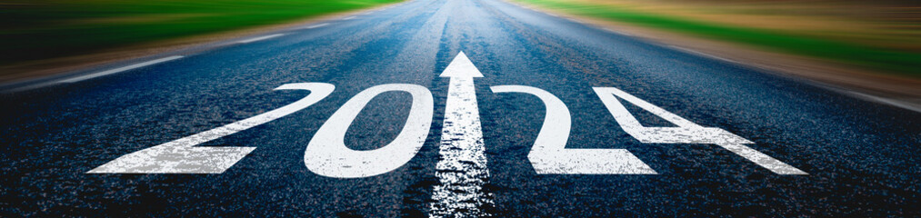 New year 2024 written on highway.Future,work start run line vision concept.Nature landscape road...