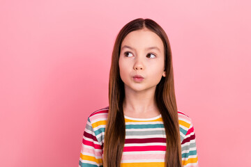 Photo of charming face small girl kid pouty lips comic humorous looking empty space thoughtful dreamy isolated on pink color background - obrazy, fototapety, plakaty