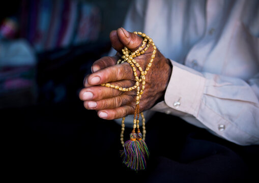 Man Praying With A Prayer Beads, Erbil, Kurdistan, Iraq