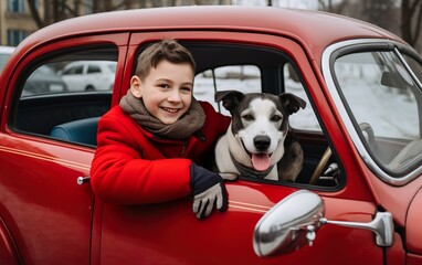 Smiling dog and boy in the backseat of a red car