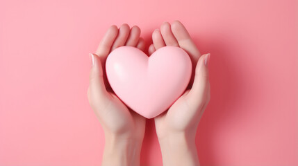 Heartfelt Gesture: Woman's Hands Cradle a Red Heart Against a Pastel Pink Background.. - obrazy, fototapety, plakaty