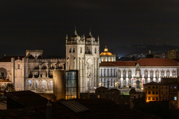 Fototapeta na wymiar Porto, Portugal A view at night of the Porto Cathedral.