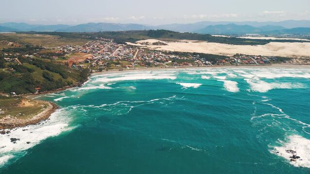 Aerial view of the Brazilian coastline with rough Atlantic Ocean. Area near the town of Imbituba