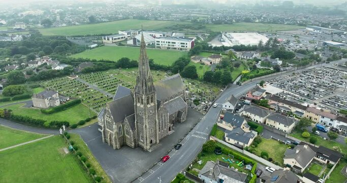Flying over Catholic Church which overlooks the entire coastal town of Tramore