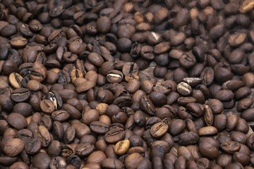 Light roast coffee. Closeup of coffee beans for background and texture. Coffee beans background.