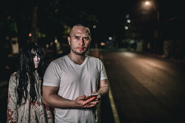 Portrait of asian woman make up ghost,Scary horror scene for background,Halloween festival concept,Ghost movies poster,The souls of the murderous lovers