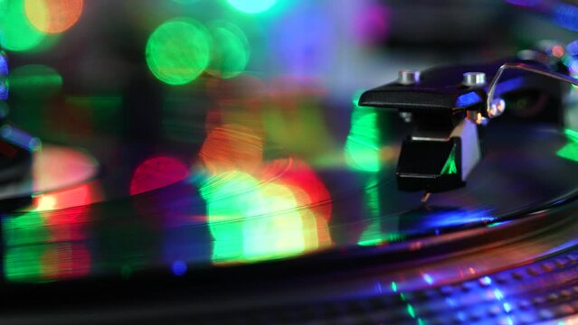 Needle of Vinyl long Play turntable on during reading music high resolution sound quality retro Smoot turn and touch for background.