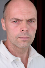 Obraz premium Portrait of a young man with a short haircut