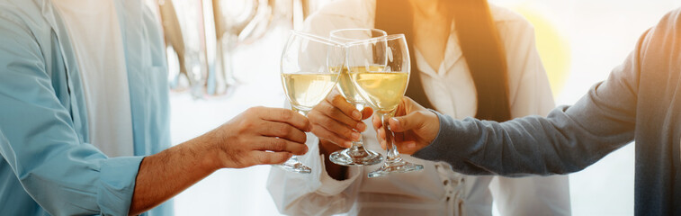 Group of young asian office girl friends having fun and celebrating pizza on table during party