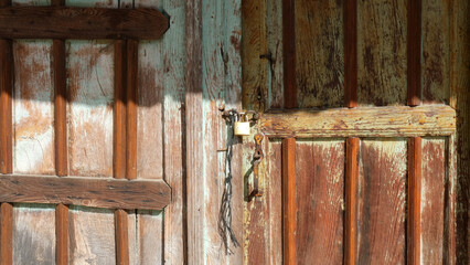 Locked wooden door of a historical house
