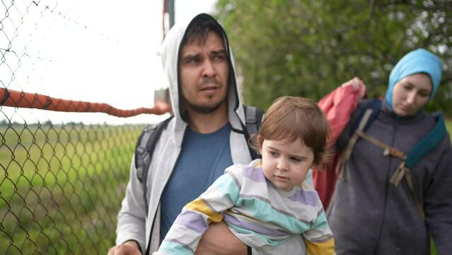 portrait refugee family runs Illegal Border crosser problem undocumented person