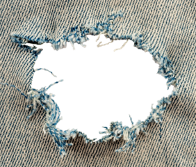 Hole in denim on a white background. Ripped jeans