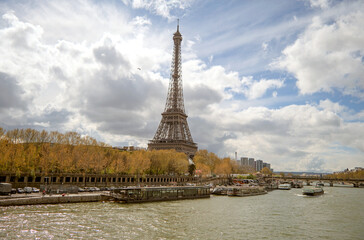 Paris, France - April 3 2019: Beautiful image of the Eiffel Tower and the Seine in a magnificent sunny day
