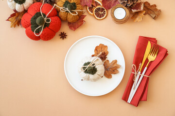 Autumn food background. White plate, cutlery and autumn decorations. Flat lay with copy space.