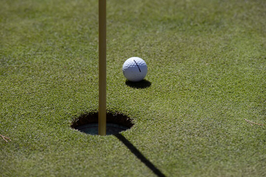 Almost made it, the golf ball near the pin and just a short putt; Olympia, Washington, United States of America