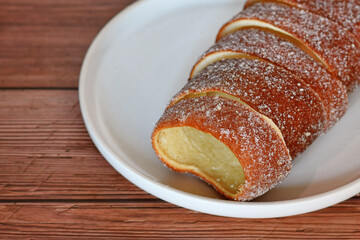 Close up of 'Kurtoskalacs', a spit cake with sugar from Hungary and Romania made from sweet yeast dough strips