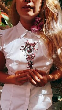 woman holding a flower, little flowers, holding flowers, garden, flower, pretty flowers, woman with little purple flowers, wedding, bride, woman, bouquet, flowers, love, dress, beauty, rose, hand, gla