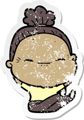 distressed sticker of a cartoon peaceful old woman