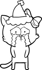hand drawn line drawing of a cat wearing santa hat