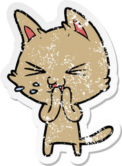 distressed sticker of a cartoon cat hissing