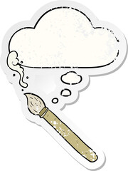 cartoon paint brush with thought bubble as a distressed worn sticker