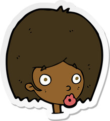 sticker of a cartoon surprised female face