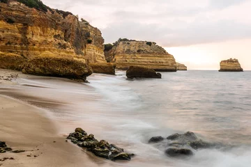 Cercles muraux Plage de Marinha, Algarve, Portugal Rocky cliffs on sandy Marinha Beach in Algarve coast at Atlantic Ocean in Portugal