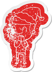 quirky cartoon distressed sticker of a friendly man wearing santa hat