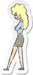 retro distressed sticker of a cartoon annoyed woman