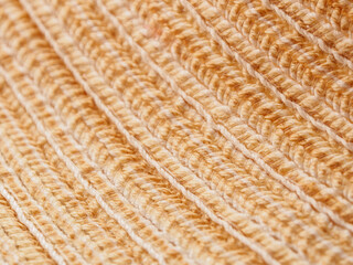 Background fiber fabric structure with seams and threads selective focus matting structure hat production close-up