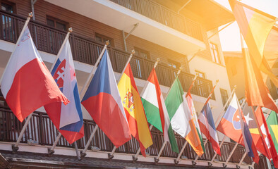 International flags of states on flagpoles concept of international relations political meetings of...