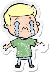 Obraz premium distressed sticker of a cartoon man crying