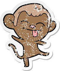 distressed sticker of a funny cartoon monkey dancing