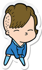 sticker of a cartoon squinting girl