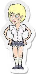 retro distressed sticker of a cartoon tough woman with hands on hips