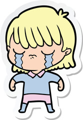sticker of a cartoon woman crying
