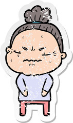 Obraz premium distressed sticker of a cartoon annoyed old lady