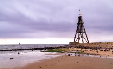 Fototapeta na wymiar Kugelbake an der Elbemündung in die Nordsee bei Cuxhaven, Niedersachsen, Deutschland