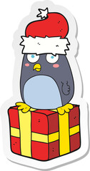 sticker of a cartoon christmas penguin
