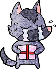 cartoon crying wolf with christmas present