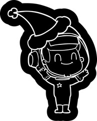 happy quirky cartoon icon of a astronaut man wearing santa hat