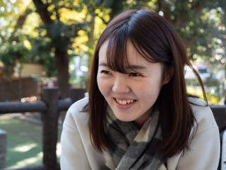 A Beautiful young Japanese woman laughing