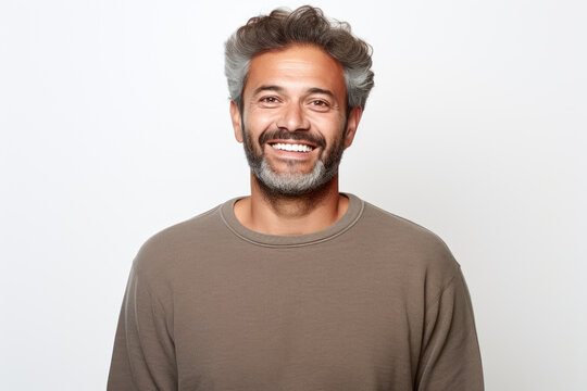 Picture of man with beard and smile on his face. This image can be used to portray happiness, confidence, or friendly demeanor. It is suitable for various projects and applications.