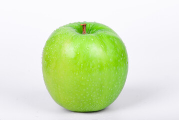 Green apple isolated on white background. Close up of fresh green apple.