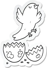 sticker of a cartoon bird hatching from egg